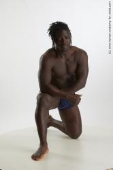 Underwear Man Black Kneeling poses - ALL Muscular Medium Kneeling poses - on one knee Black Standard Photoshoot Academic